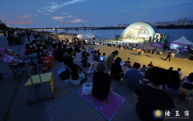 Domestic and foreign visitors enjoy the 2022 Hangang River Festival Summer on July 29, 2022, at Yeouido Hangang River Park.